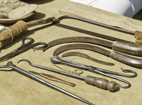 Outdoor display of surgical instruments similar to those used to treat wounded soldiers during the American Revolutionary War (1775-1783)
