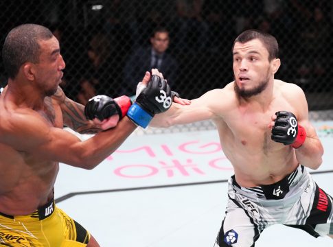 LAS VEGAS, NEVADA - JANUARY 14: (R-L) Umar Nurmagomedov of Russia punches Raoni Barcelos of Brazil in a bantamweight fight during the UFC Fight Night event at UFC APEX on January 14, 2023 in Las Vegas, Nevada. (Photo by Chris Unger/Zuffa LLC via Getty Images)